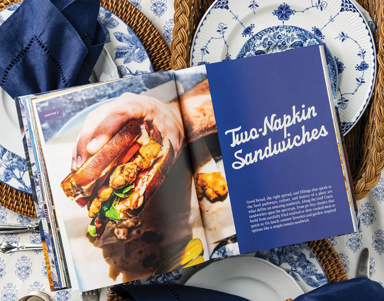 The cookbook open to the Two-Napkin Sandwiches chapter